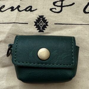 Nena and Co AirPod case in evergreen leather